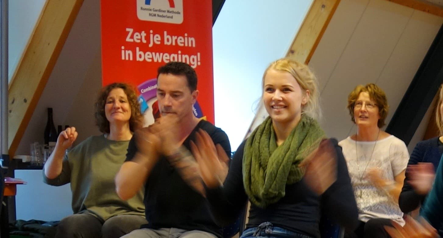 Participants practising rhythm and movement during an RGM course